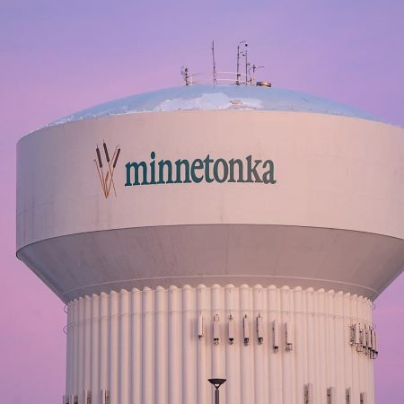 The water tower in the City of Minnetonka, Minnesota, during a winter sunset.